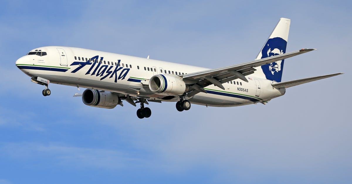 Flying with a bicycle with Swiss/Austrian/Brussels airlines - Alaska Airlines Plane in the Sky Flying with a bicycle with Swiss/Austrian/Brussels airlines - Alaska Airlines Plane in the Sky