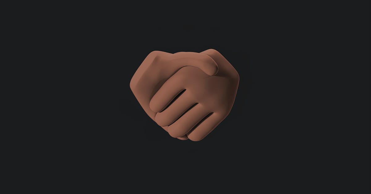 Flying with a Prusa Mendel 3d printer - Persons Hand on Black Background Flying with a Prusa Mendel 3d printer - Persons Hand on Black Background