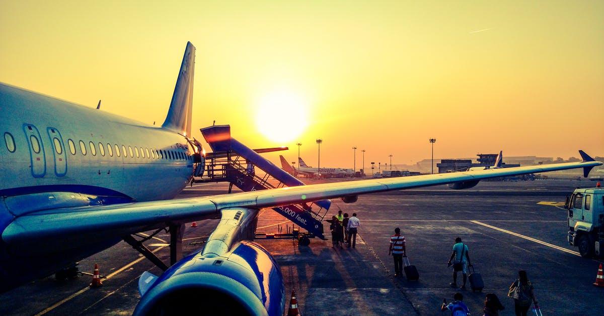 Flying with Emirates and confused about luggage - Photography of Airplane during Sunrise Flying with Emirates and confused about luggage - Photography of Airplane during Sunrise