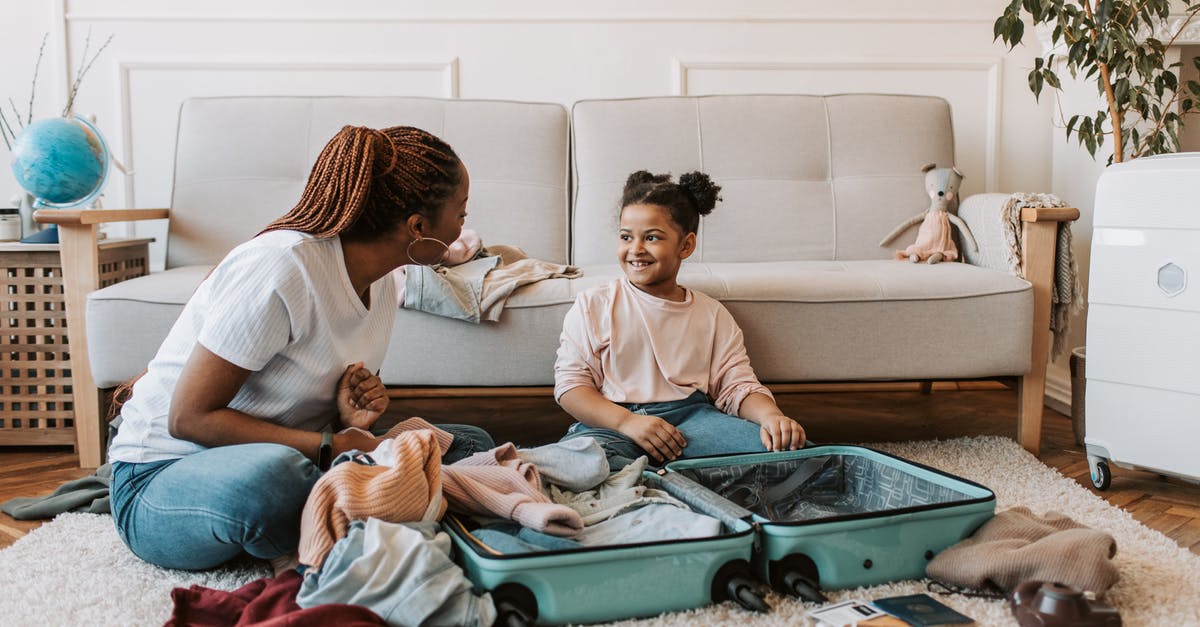 Folding strollers allowed as hand baggage on Norwegian? - Mother and Daughter Packing Clothes Folding strollers allowed as hand baggage on Norwegian? - Mother and Daughter Packing Clothes