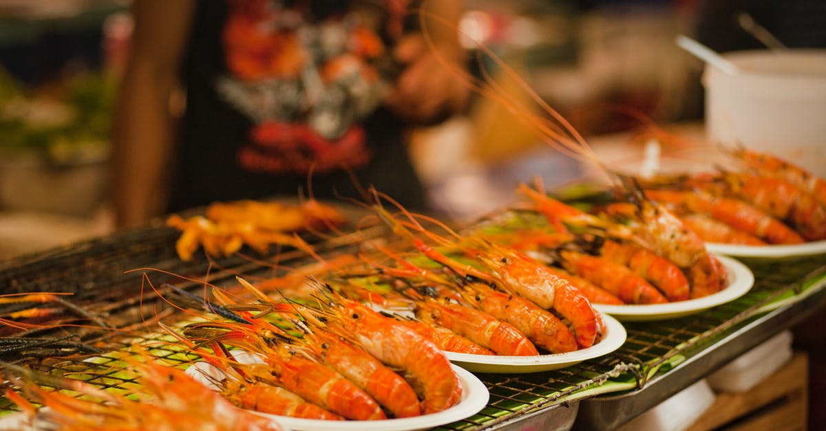 Food options in Bangkok - Pile of Shrimps on Plates Food options in Bangkok - Pile of Shrimps on Plates