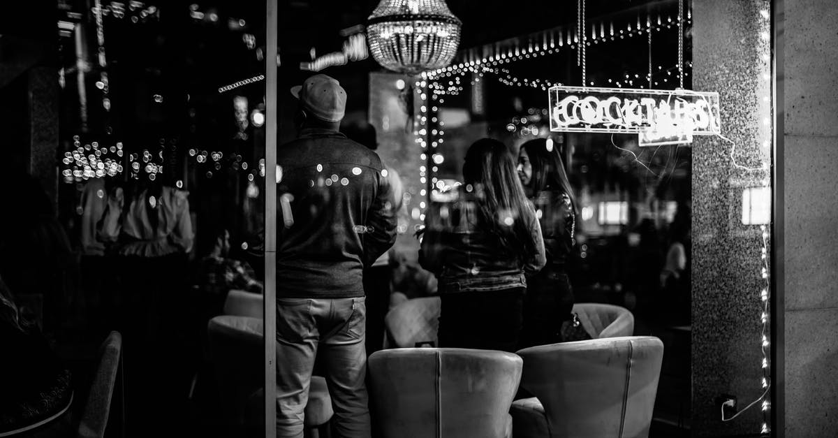 For a Eurostar ticket booked through Deutsche Bahn, how do I request a special meal? - Black and white of young anonymous people spending time in bar with bright lights at night For a Eurostar ticket booked through Deutsche Bahn, how do I request a special meal? - Black and white of young anonymous people spending time in bar with bright lights at night