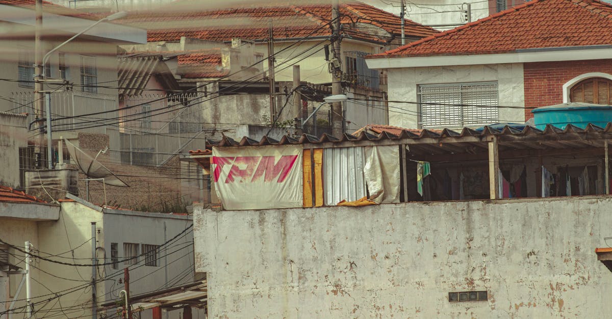 For a Spanish visa do I need accommodation booked for the day I am due to fly out at midnight? - Poor district of slum with shabby houses For a Spanish visa do I need accommodation booked for the day I am due to fly out at midnight? - Poor district of slum with shabby houses
