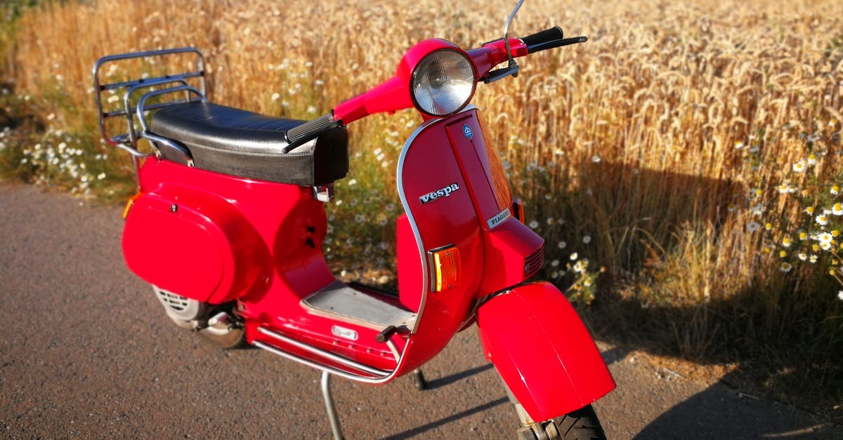 Foreign motorcycle licence in Costa Rica at 16 - Red Motor Scooter on Brown Field Foreign motorcycle licence in Costa Rica at 16 - Red Motor Scooter on Brown Field