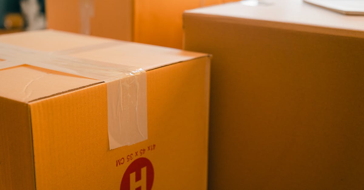 Four to six days in Scottish Highlands - questions about renting cars and accommodation [closed] - Cardboard containers sealed with sticky tape for relocation placed near window on sunny day