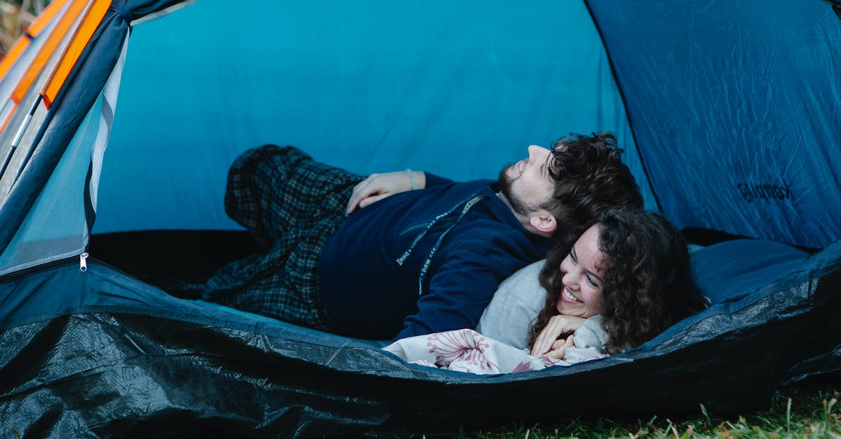 Free tent camping location close to Adelaide? - Young happy couple lying together in camping tent and enjoying weekend in countryside Free tent camping location close to Adelaide? - Young happy couple lying together in camping tent and enjoying weekend in countryside