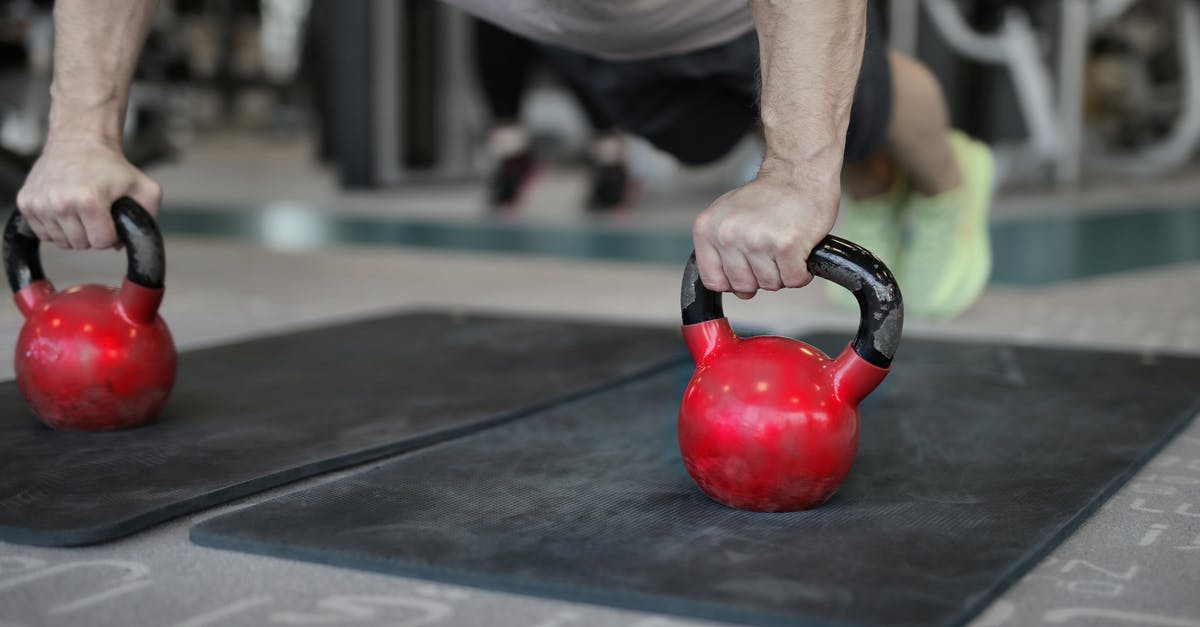 Free Wi-Fi / available power / cashless food facilities in LAX airport? - Muscular sportsman doing plank exercise on kettlebells Free Wi-Fi / available power / cashless food facilities in LAX airport? - Muscular sportsman doing plank exercise on kettlebells