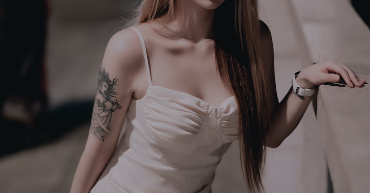 French rules for long stay visa: OFII - Woman in White Spaghetti Strap Dress French rules for long stay visa: OFII - Woman in White Spaghetti Strap Dress