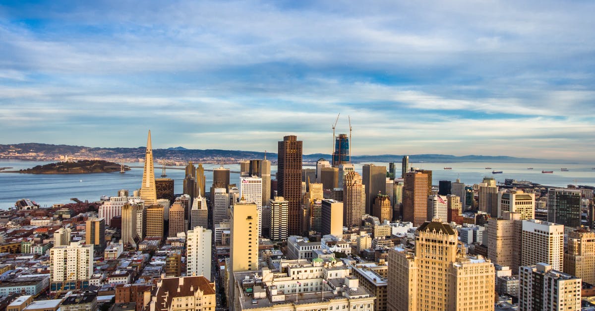 Gate checking a stroller at San Francisco with Singapore Airlines - High Angle View of Cityscape Against Cloudy Sky
