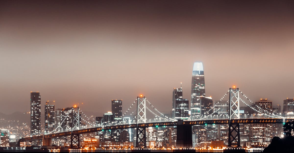 Gate checking a stroller at San Francisco with Singapore Airlines - City Skyline during Night Time