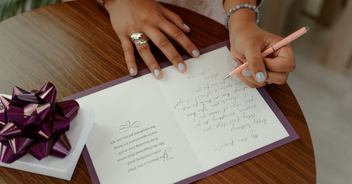 Georgia invitation letter for visa - Person writing on a White Paper Georgia invitation letter for visa - Person writing on a White Paper