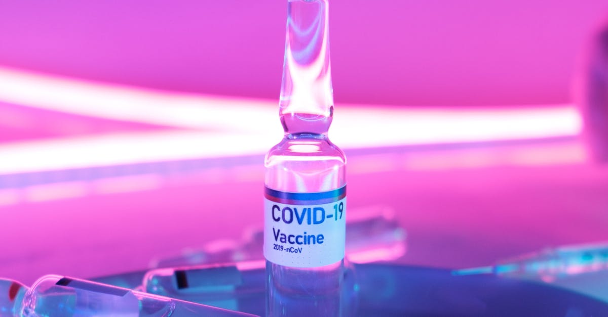 Get 2nd dose of COVID vaccine in the US as a tourist - Glass clean ampoule with vaccine for COVID 19 Get 2nd dose of COVID vaccine in the US as a tourist - Glass clean ampoule with vaccine for COVID 19