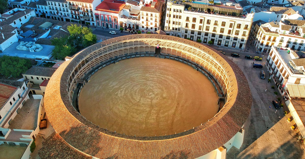 Getting a "Número de Identidad de Extranjero" (NIE number) for a 10-day trip in Spain - Bullfight arena in city district in Spain Getting a "Número de Identidad de Extranjero" (NIE number) for a 10-day trip in Spain - Bullfight arena in city district in Spain
