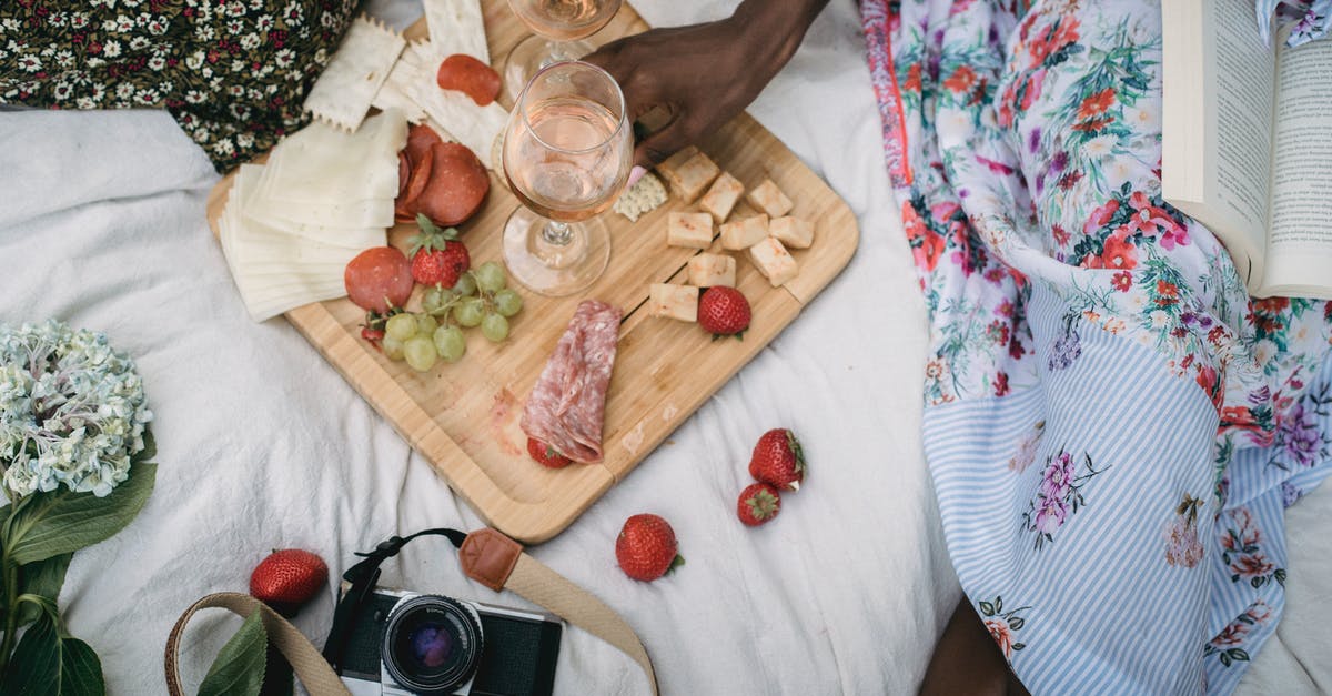 Getting into a fully booked hotel? - Hand Getting Food on the Wooden Tray Getting into a fully booked hotel? - Hand Getting Food on the Wooden Tray