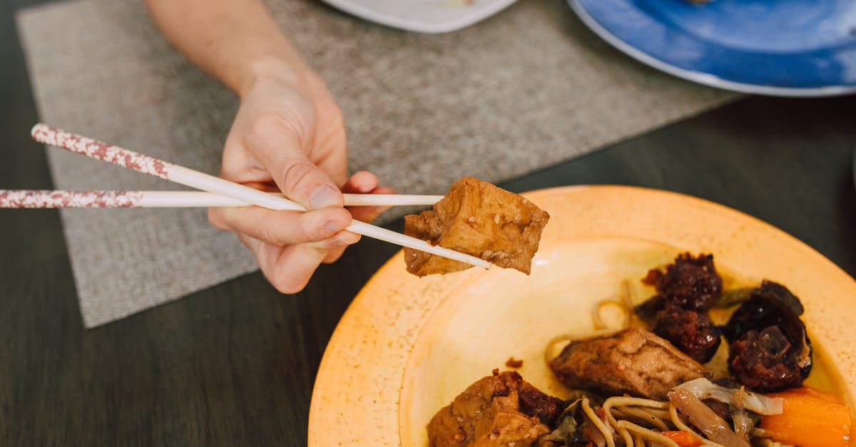 Getting serial refusals for Schengen Visas - Person Holding Chopsticks and Pasta on Plate Getting serial refusals for Schengen Visas - Person Holding Chopsticks and Pasta on Plate