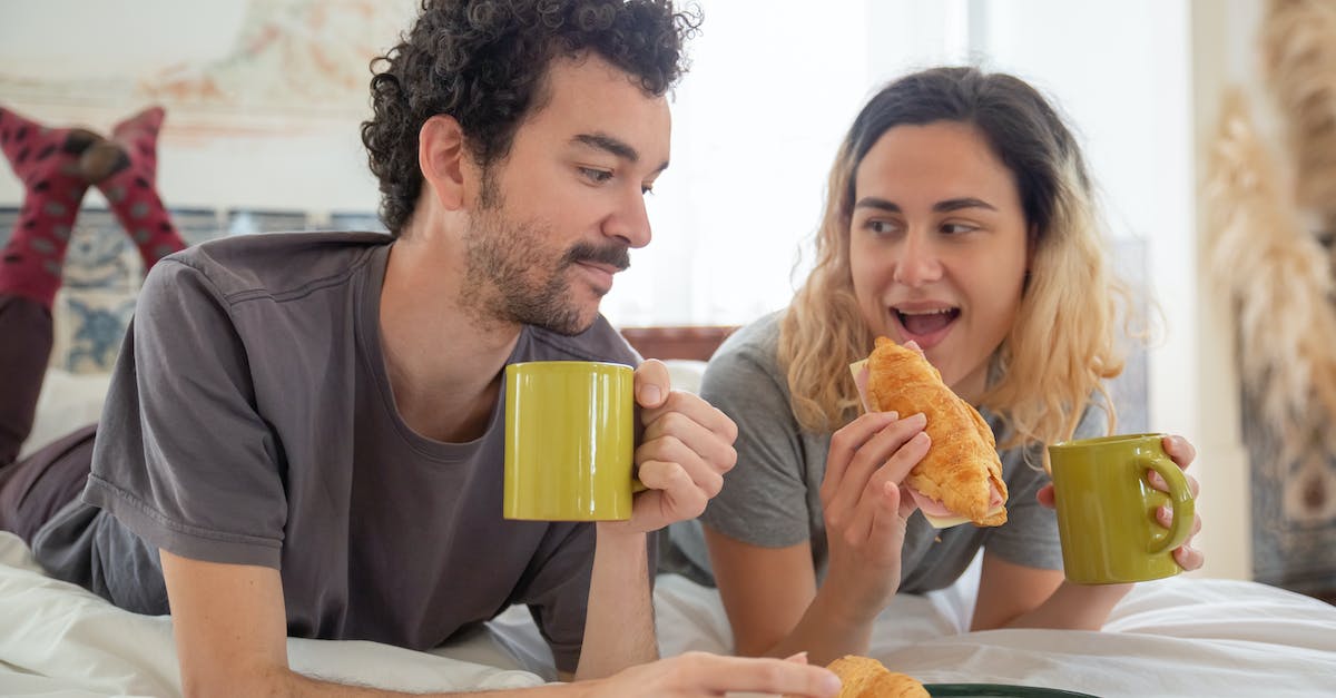 Gluten-free eating in Peru - Man in Gray Crew Neck T-shirt Holding Yellow Ceramic Mug Gluten-free eating in Peru - Man in Gray Crew Neck T-shirt Holding Yellow Ceramic Mug