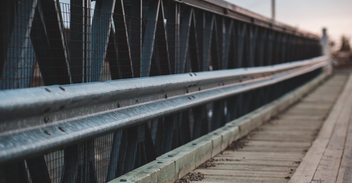 Going to a border to get another 90 days of visa waiver - Wooden bridge with metal railing Going to a border to get another 90 days of visa waiver - Wooden bridge with metal railing