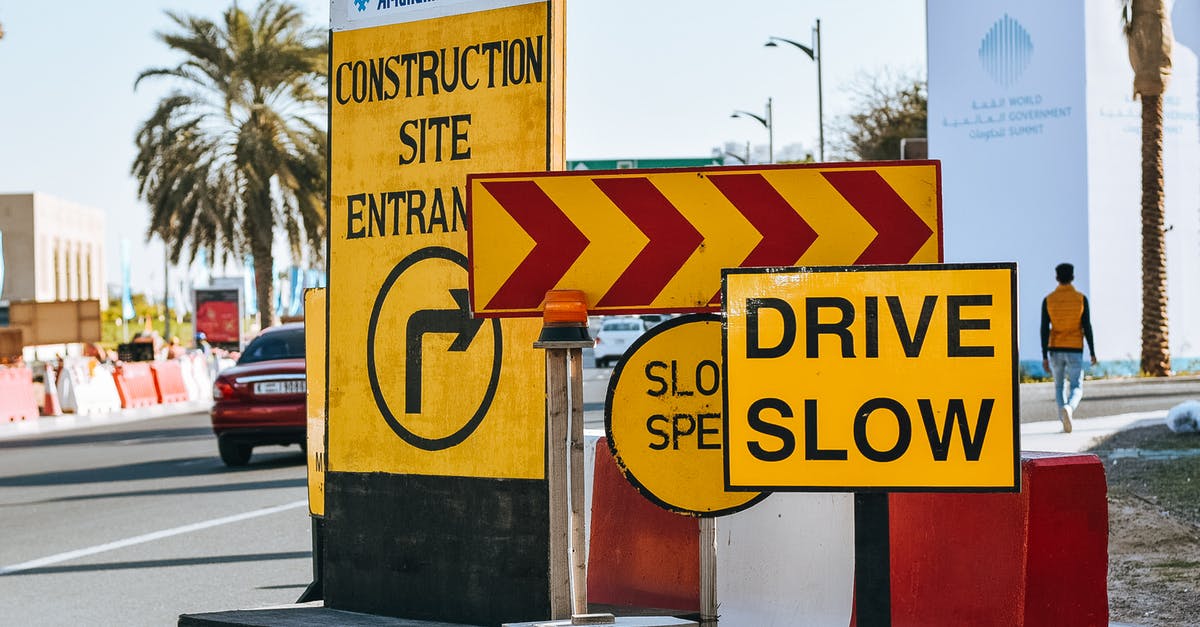 Going to St. Petersburg not finding my usual warnings/scam site - Contemporary city road on sunny day with various traffic signs warning about driving slow because of construction site entrance Going to St. Petersburg not finding my usual warnings/scam site - Contemporary city road on sunny day with various traffic signs warning about driving slow because of construction site entrance