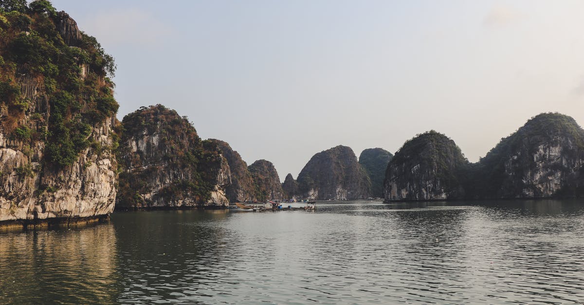 Ha Long Bay Viewpoints - Body of Water Near Rock Formations Ha Long Bay Viewpoints - Body of Water Near Rock Formations