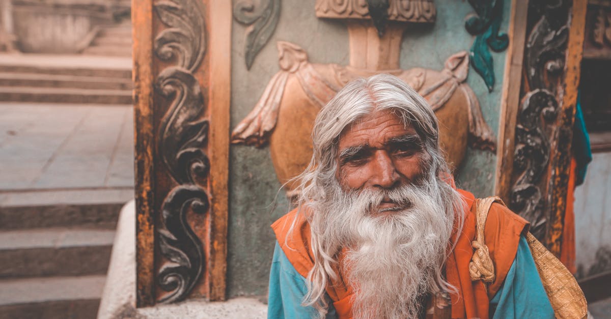 Halifax long layover, recheck bags? - Elderly Hindu man with gray beard in town
