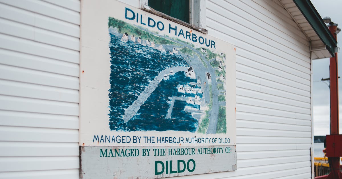 Hard copy travel guides with information on Tohoku post-tsunami - Signboard on cottage with location name Dildo Harbour