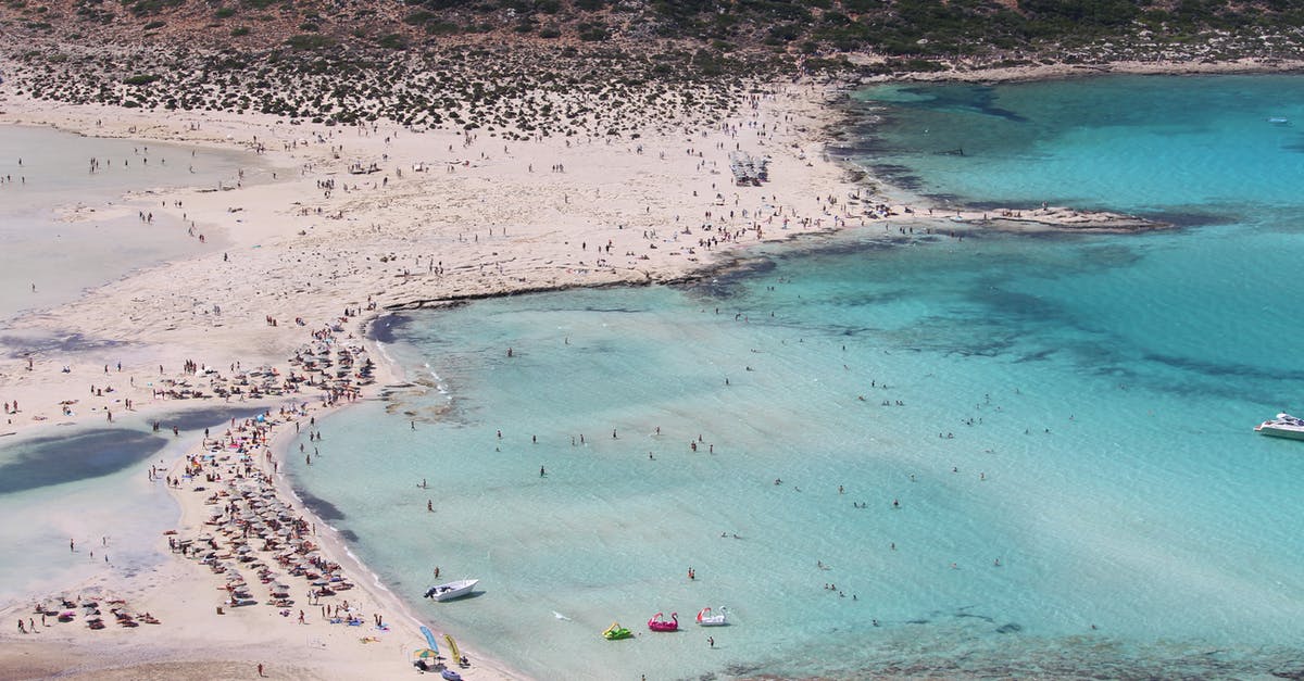 Has Crete changed since the recession? - People on Beach Has Crete changed since the recession? - People on Beach