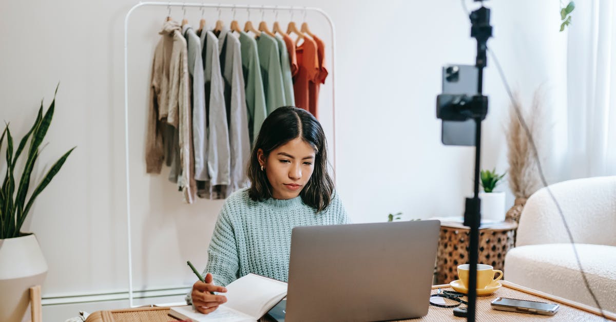 Have anyone experienced inspection of their laptop or digital media content? [duplicate] - Focused blogger working on project at home