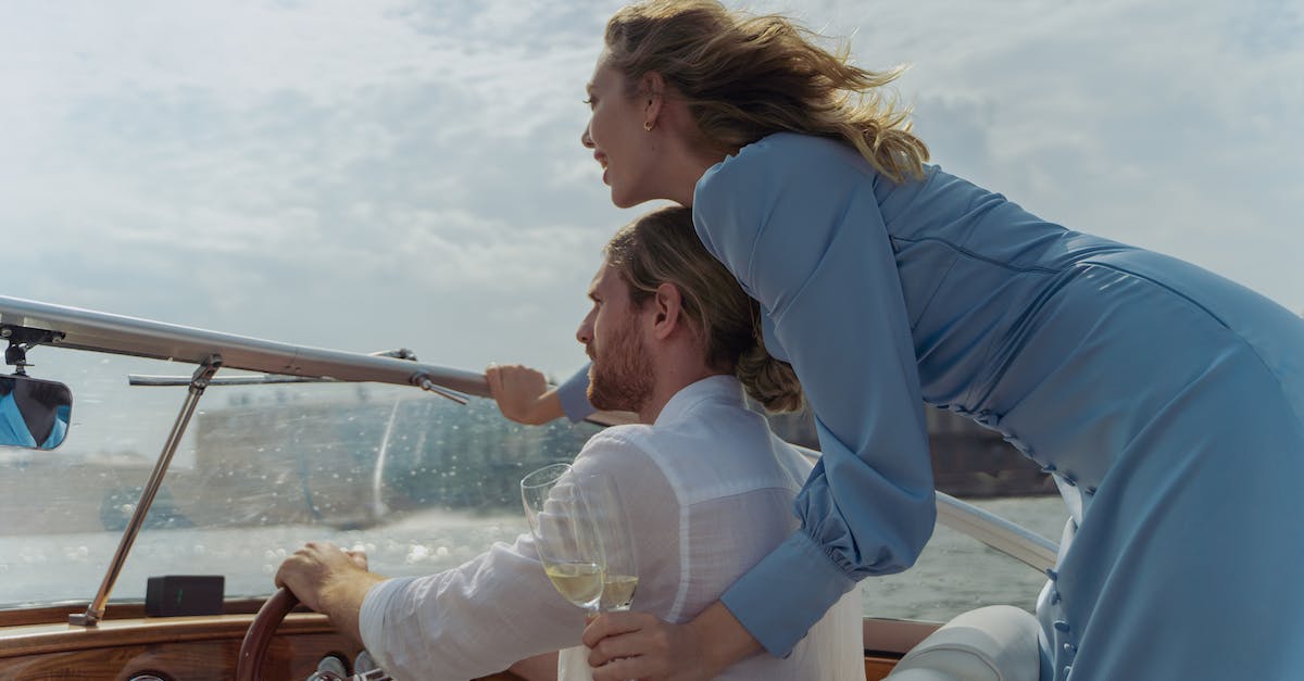 Have feelings of Greeks changed towards European tourists because of the crisis? - Couple Driving a Boat Together Have feelings of Greeks changed towards European tourists because of the crisis? - Couple Driving a Boat Together