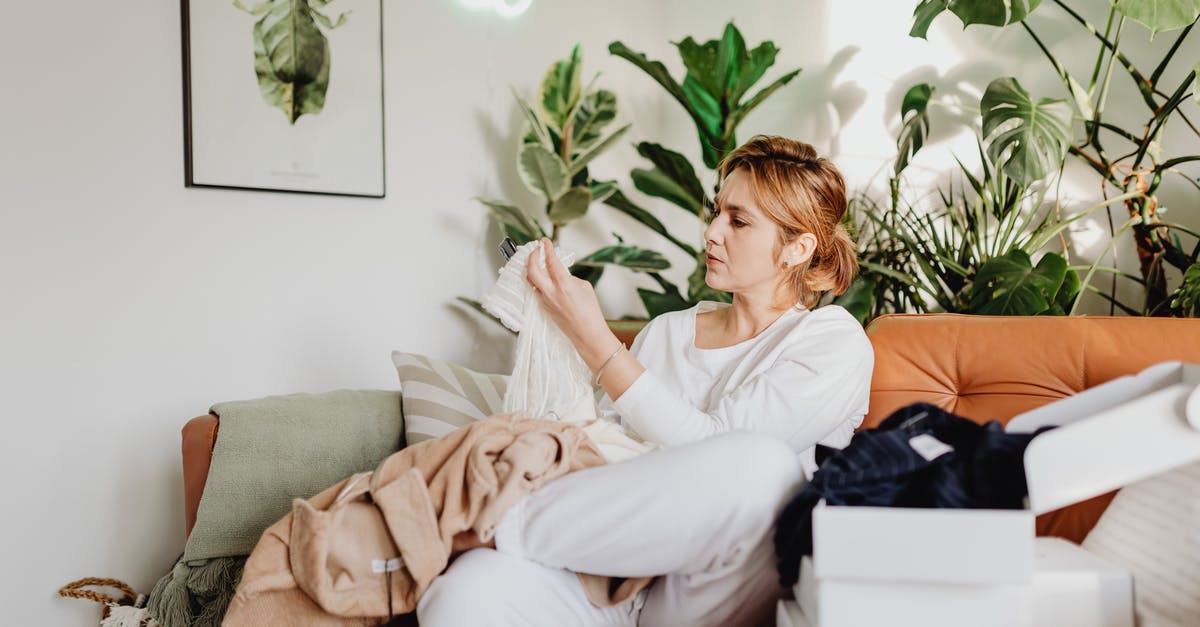 Having bought flight tickets from a third party, how do I check-in online? - Woman Looking Through Stack of Clothes Bought Online Having bought flight tickets from a third party, how do I check-in online? - Woman Looking Through Stack of Clothes Bought Online
