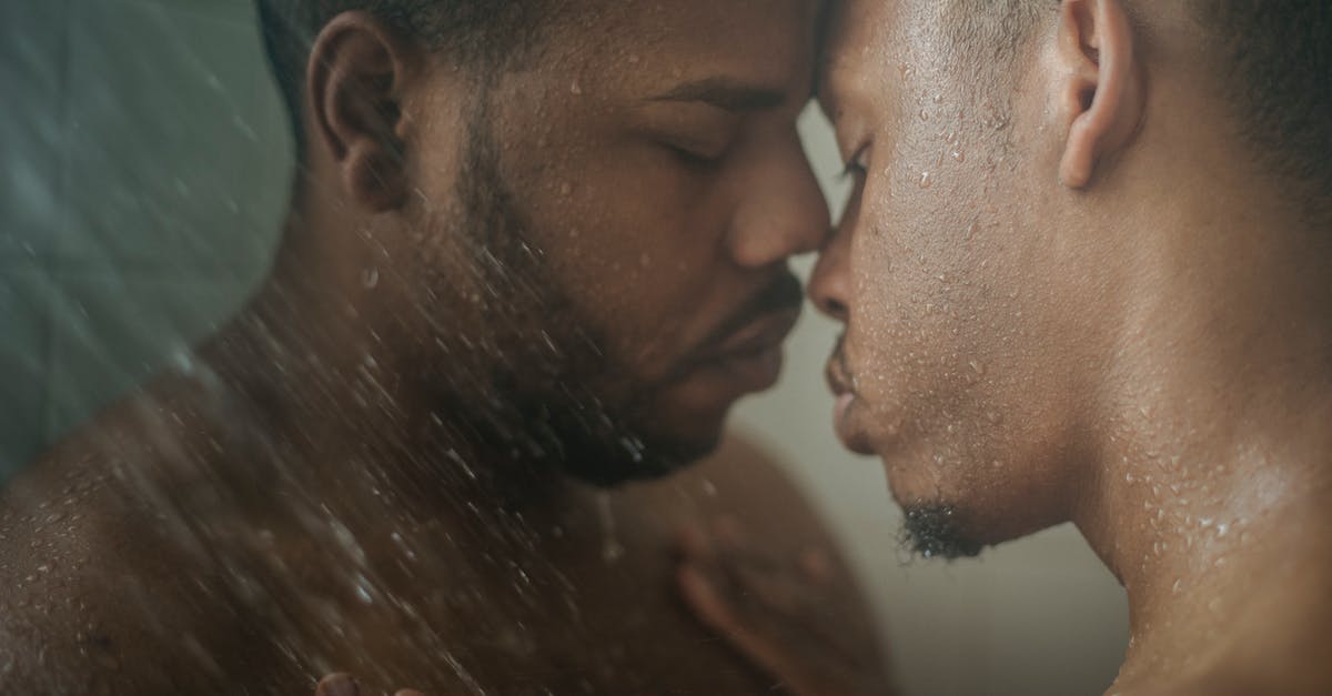 Having Schengen visa for Germany. Transiting through Paris is possible without having transit visa? [duplicate] - Close-up of Men Having Shower Together