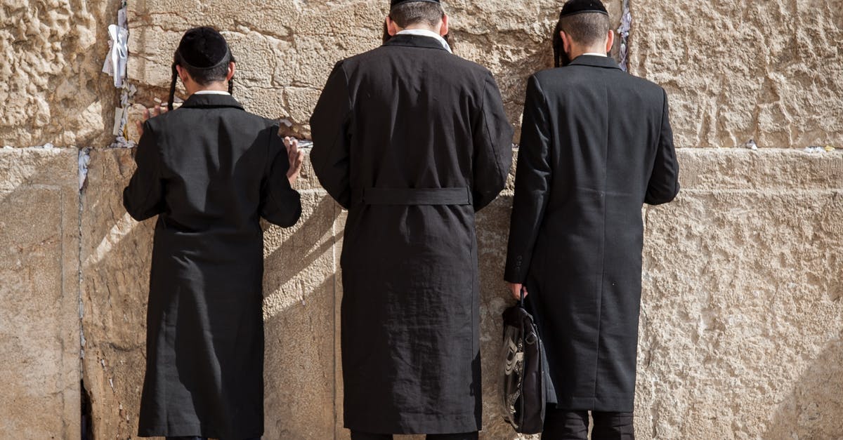 Hebrew language class in Israel - Anonymous religious Hasidim Jews during pray near Western Wall Hebrew language class in Israel - Anonymous religious Hasidim Jews during pray near Western Wall