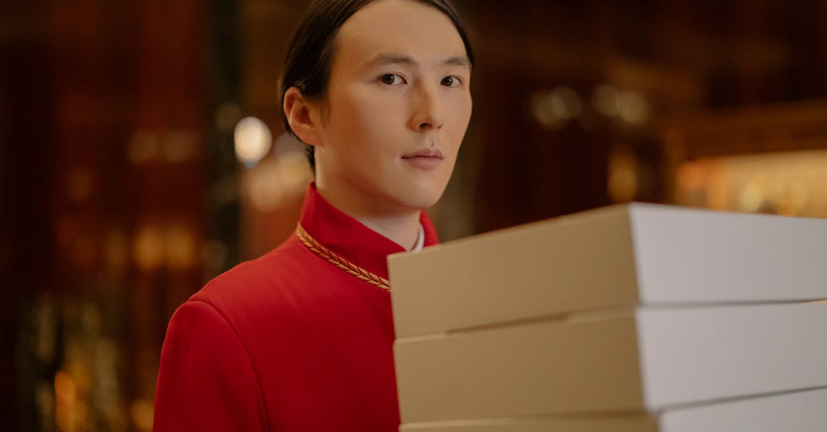 Help remembering name of hotel in near Łódź, Poland? - Man Carrying White Boxes Help remembering name of hotel in near Łódź, Poland? - Man Carrying White Boxes