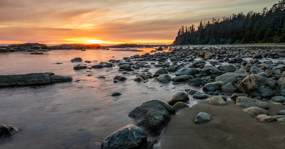 Hiking around Vancouver, Canada? - Rocky Shore With Rocks on the Shore during Sunset Hiking around Vancouver, Canada? - Rocky Shore With Rocks on the Shore during Sunset