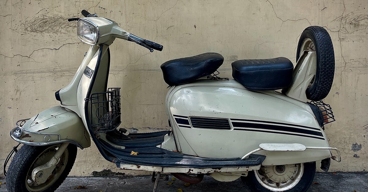 Hire a scooter near San Javier Airport, Spain? - White and Black Motor Scooter Hire a scooter near San Javier Airport, Spain? - White and Black Motor Scooter