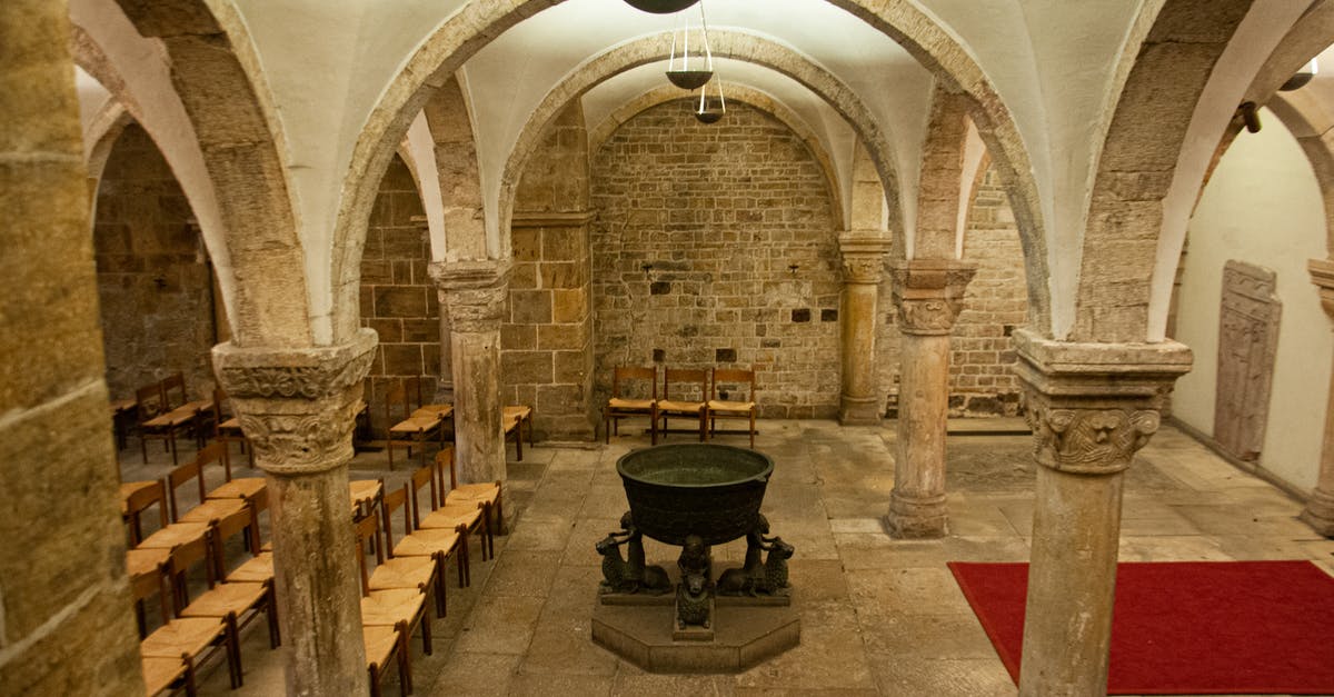 Hitchhiking in Europe under the age of 18 - Brown Wooden Chairs Inside Building