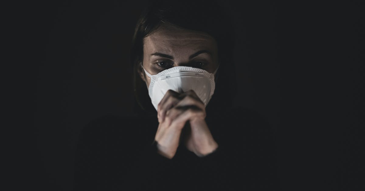 Hodophobia ... Scared of doing things or going to places that is dangerous [closed] - Woman in Black Long Sleeve Shirt Wearing White Mask