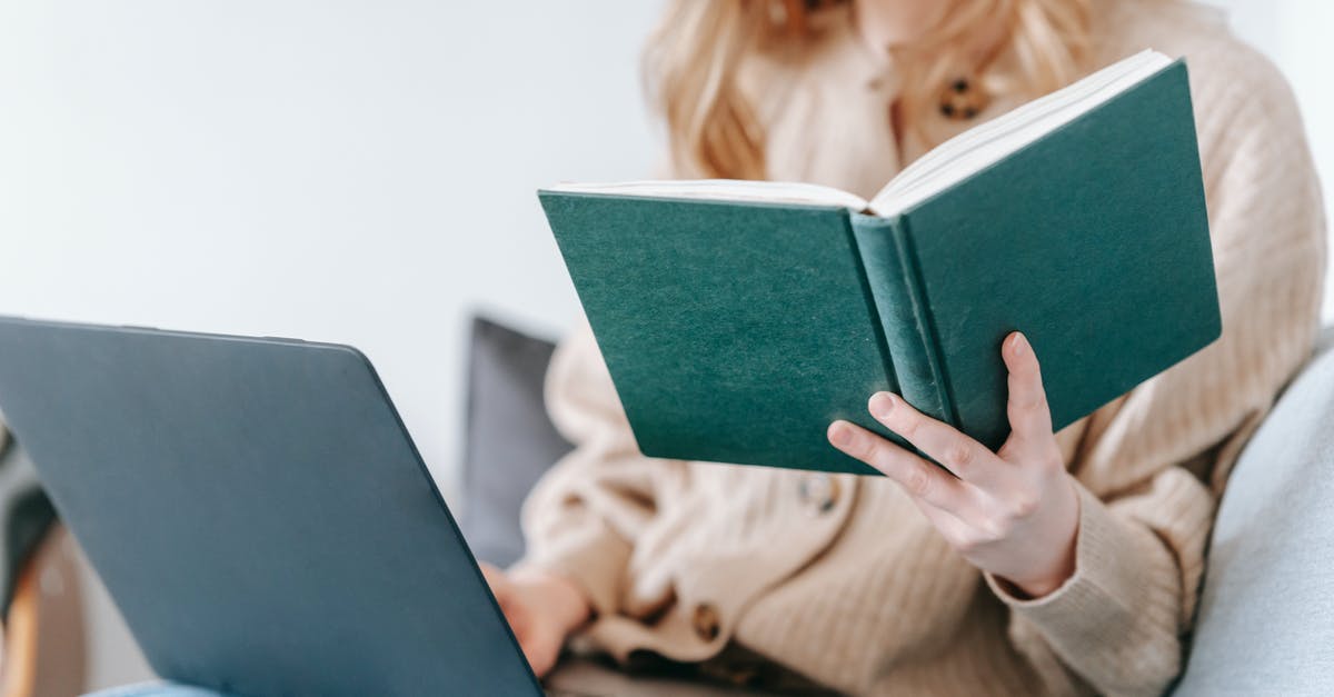 How are laptop searches conducted at immigration/customs/border check points? [closed] - Crop unrecognizable female checking planner while freelancing with netbook on blurred background in daylight