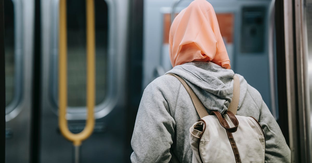 How bad does traffic get between East Hamilton and Oakville, Ontario? - Woman with backpack in subway How bad does traffic get between East Hamilton and Oakville, Ontario? - Woman with backpack in subway