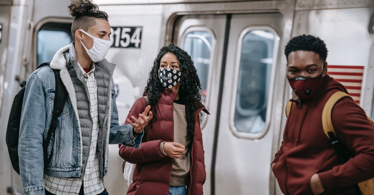 How best to prevent data loss while travelling? - Diverse partners in masks speaking on metro How best to prevent data loss while travelling? - Diverse partners in masks speaking on metro
