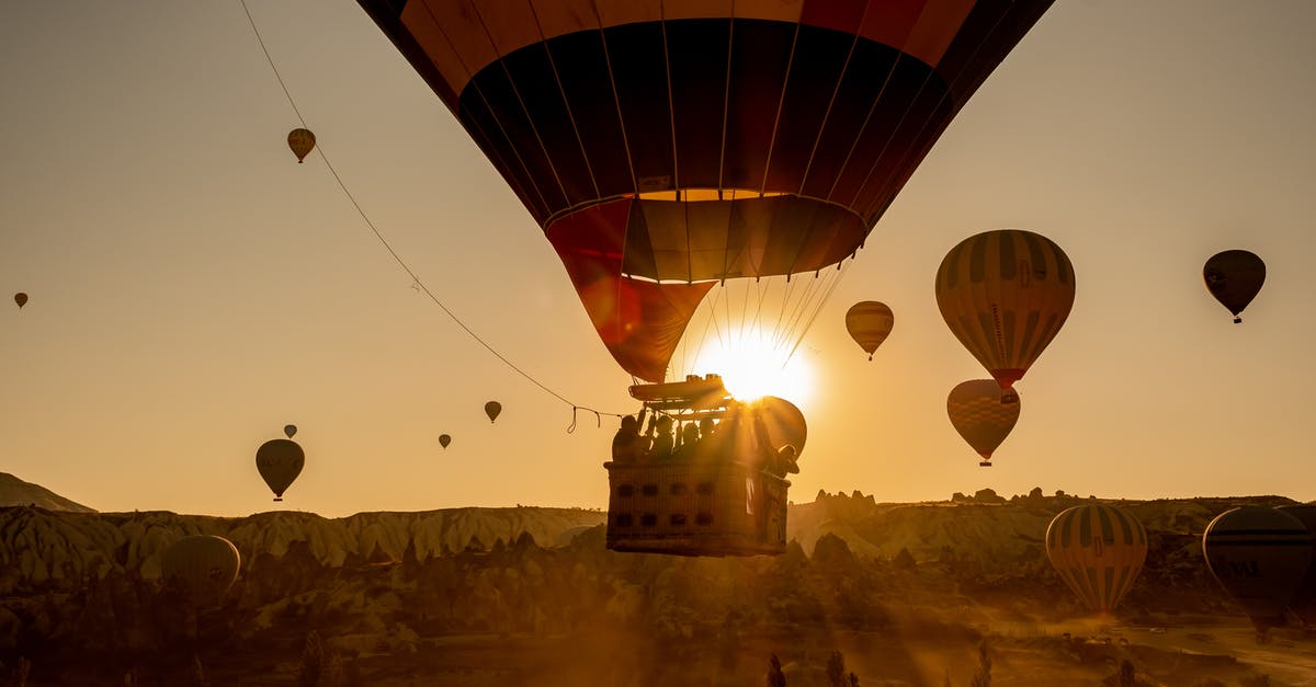 How can a travel agent issue cheap tickets just a few hours before a flight? - Hot Air Balloons in Mid Air during Golden Hour How can a travel agent issue cheap tickets just a few hours before a flight? - Hot Air Balloons in Mid Air during Golden Hour
