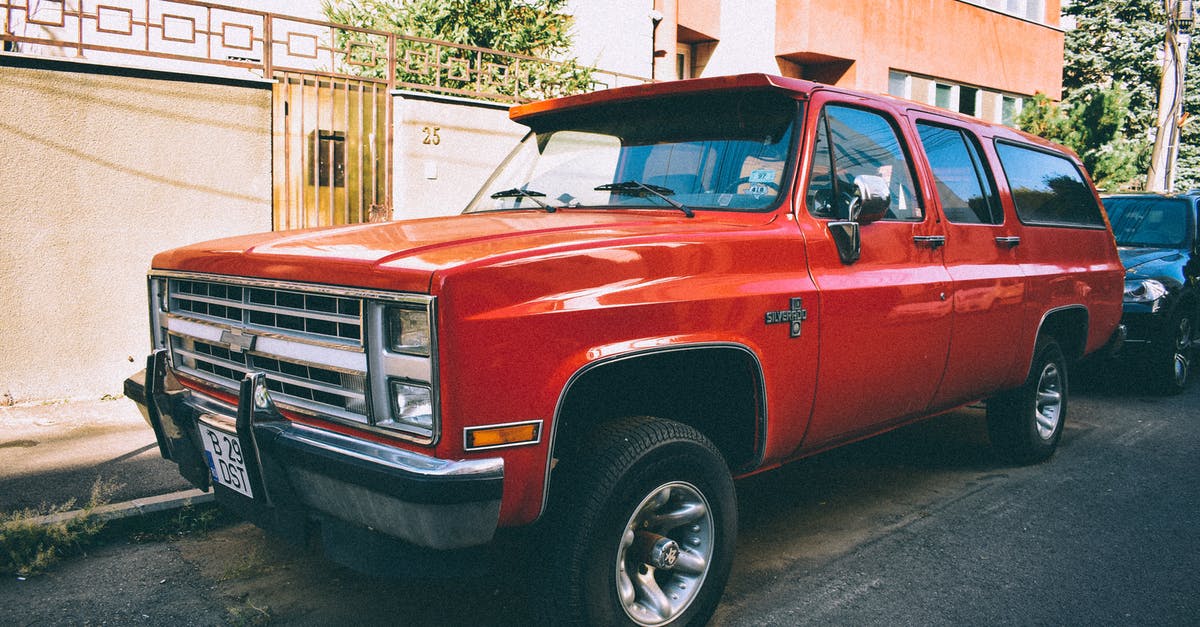 How can I add headlights to a rented car? - Orange Chevrolet Crew Cab Pickup Truck Parked on Road Side How can I add headlights to a rented car? - Orange Chevrolet Crew Cab Pickup Truck Parked on Road Side