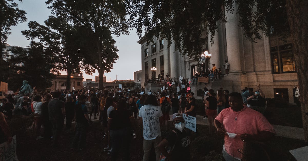 How can I change my visa appointment to another country? - Multiethnic people in demonstration for rights in city How can I change my visa appointment to another country? - Multiethnic people in demonstration for rights in city
