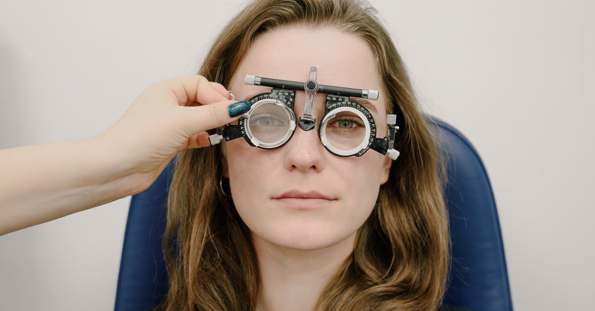 How can I choose my time of visit to avoid the crowds at the Paris Catacombs? - Woman choosing proper lens diopters How can I choose my time of visit to avoid the crowds at the Paris Catacombs? - Woman choosing proper lens diopters