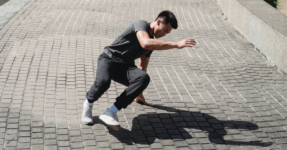 How can I determine if I need an International Driving Permit? - Energetic Asian man dancing street dance on sidewalk How can I determine if I need an International Driving Permit? - Energetic Asian man dancing street dance on sidewalk