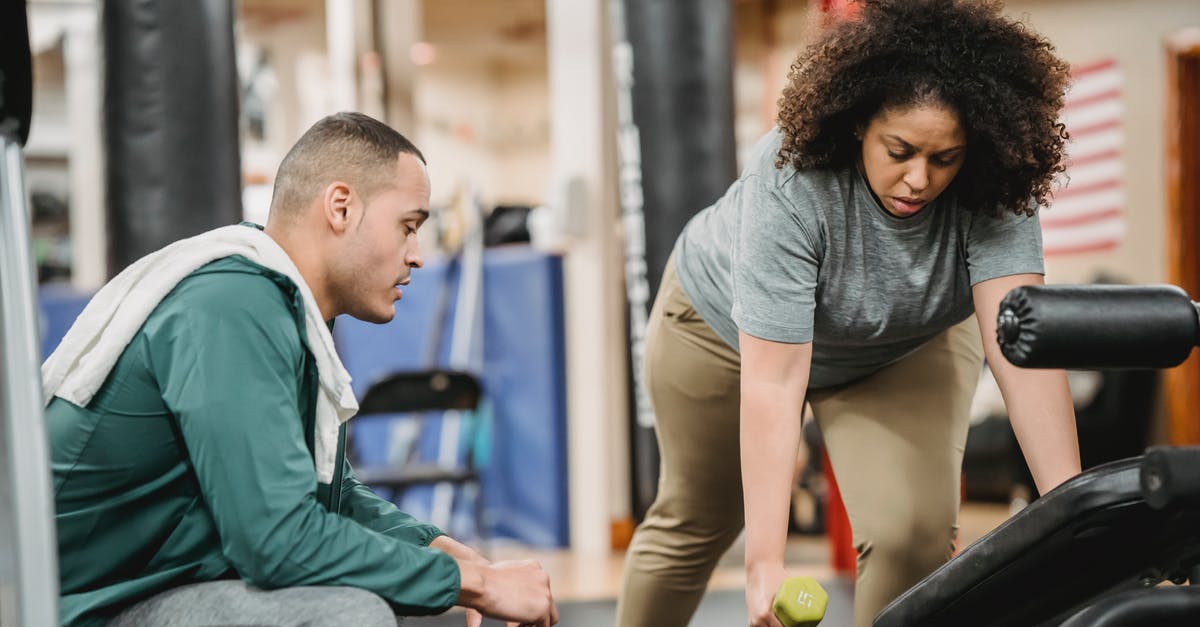 How can I determine the carry-on size / weight limits and restrictions for a US domestic flight? - Multiethnic man and woman training together in gym How can I determine the carry-on size / weight limits and restrictions for a US domestic flight? - Multiethnic man and woman training together in gym