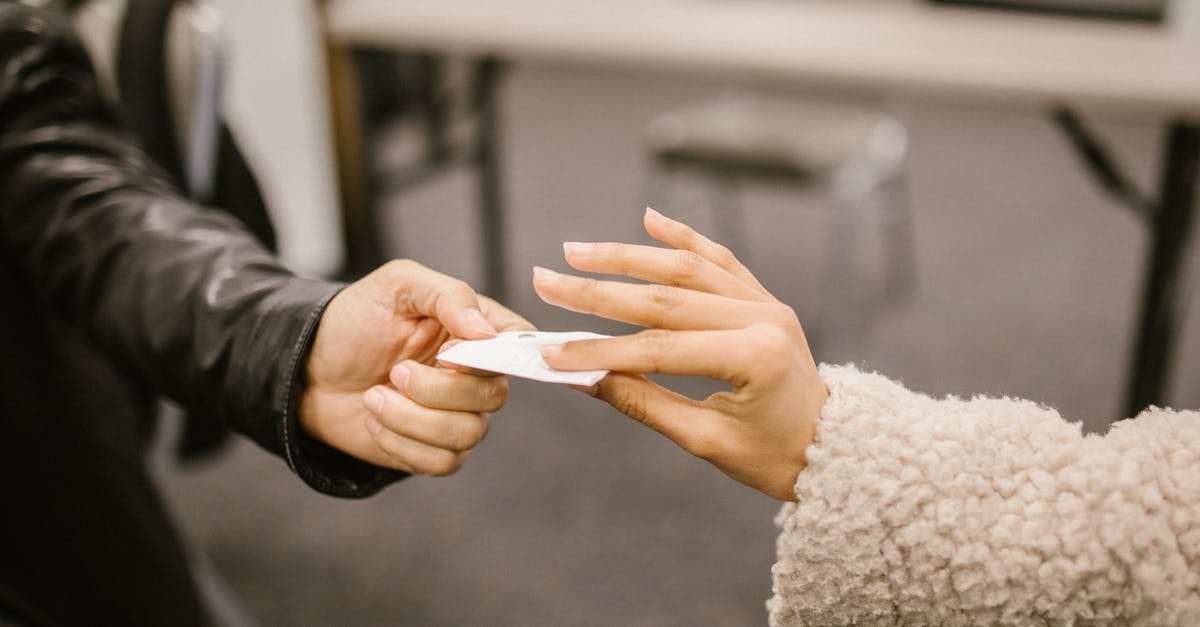 How can I get an Australian ETA offline? - Shallow Focus Photo of Students Cheating During an Exam