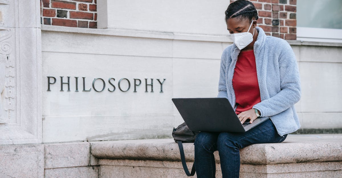 How can I get EU Digital COVID Certificate? - Concentrated young African American female student in casual clothes and medical mask sitting near Philosophy faculty and typing on laptop How can I get EU Digital COVID Certificate? - Concentrated young African American female student in casual clothes and medical mask sitting near Philosophy faculty and typing on laptop