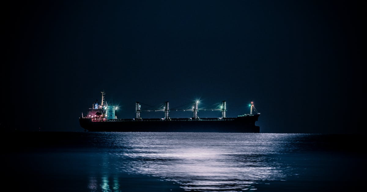 How can I get to Iceland on a cargo ship? - White and Red Cargo Ship on Dock How can I get to Iceland on a cargo ship? - White and Red Cargo Ship on Dock