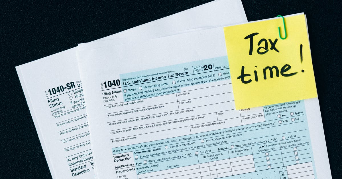How can I obtain my time in USA information for tax purposes? - Tax Documents on the Table How can I obtain my time in USA information for tax purposes? - Tax Documents on the Table