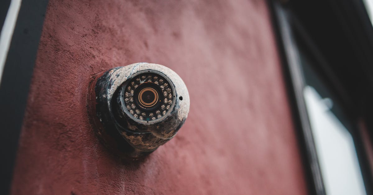 How can I protect camera equipment in checked baggage? - Old security camera on shabby building wall How can I protect camera equipment in checked baggage? - Old security camera on shabby building wall